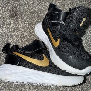 Nike Kids Black and Gold Sneakers